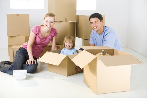 Professional removal van loading furniture and boxes for a Shepherds Bush move