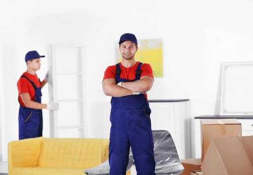 Same day removals team handling urgent moving boxes in Shepherds Bush