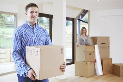 Movers using careful handling techniques during a local relocation