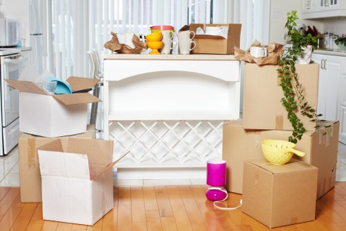 Packed office boxes and equipment ready for transport