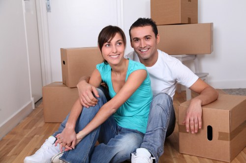 Urgent home removal service in Shepherds Bush with boxes and furniture