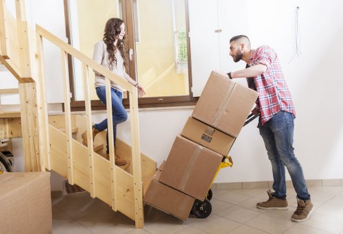 Careful transport of student belongings through Shepherds Bush streets