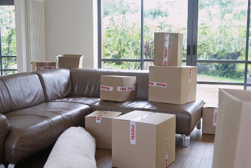 Packed boxes and furniture prepared for storage in Shepherds Bush