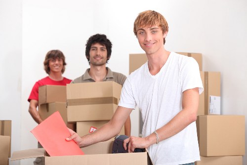 Local movers transporting furniture from a Shepherds Bush flat on short notice