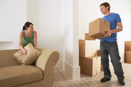 Van moving household items with careful handling